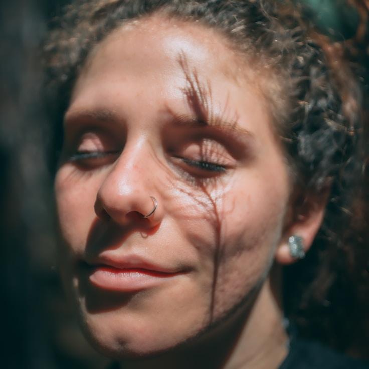 Anaya Rao, Lead Design Curator at Universal Data Connect, reviewing corporate floral arrangements